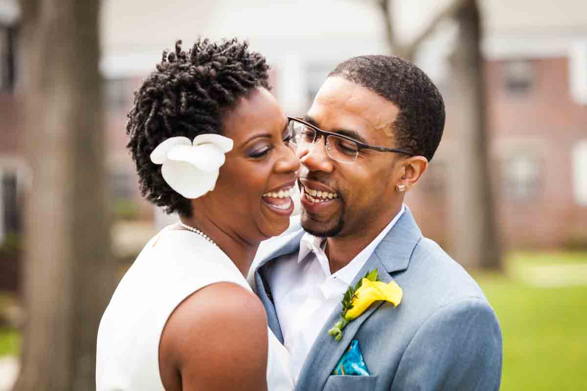 Wedding portrait of African American couple in Flushing Meadows Corona Park