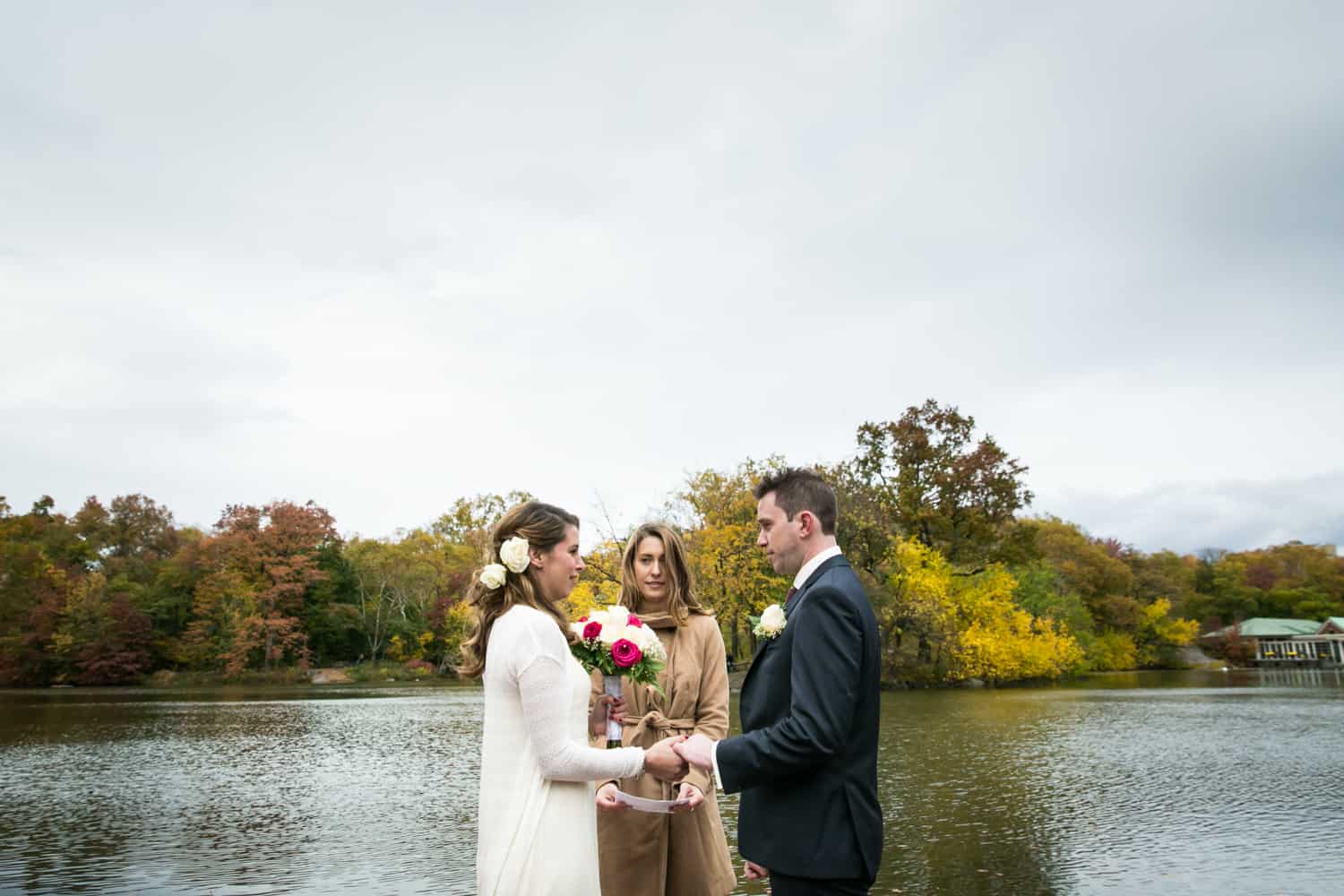 Bride and groom exchanging vows at a Bethesda Fountain wedding in Central Park