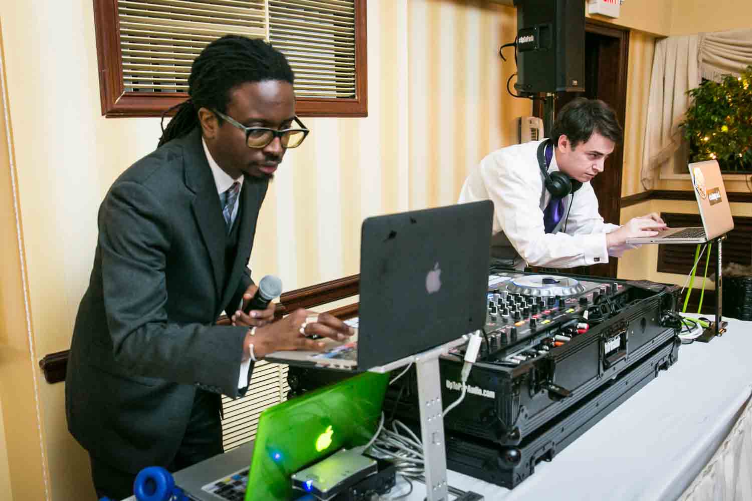 DJ and bride's brother playing music