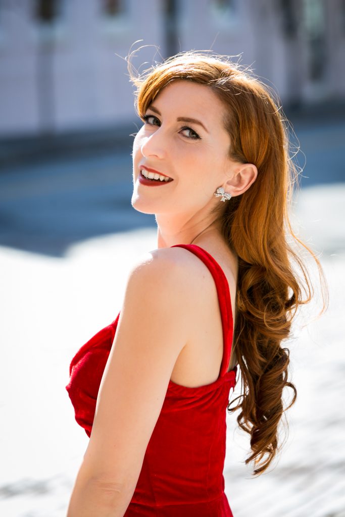 Model wearing red velvet dress