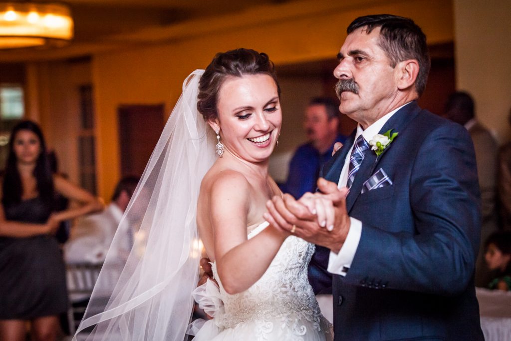 Bride dancing with her father for an article on how to get the wedding photos you want