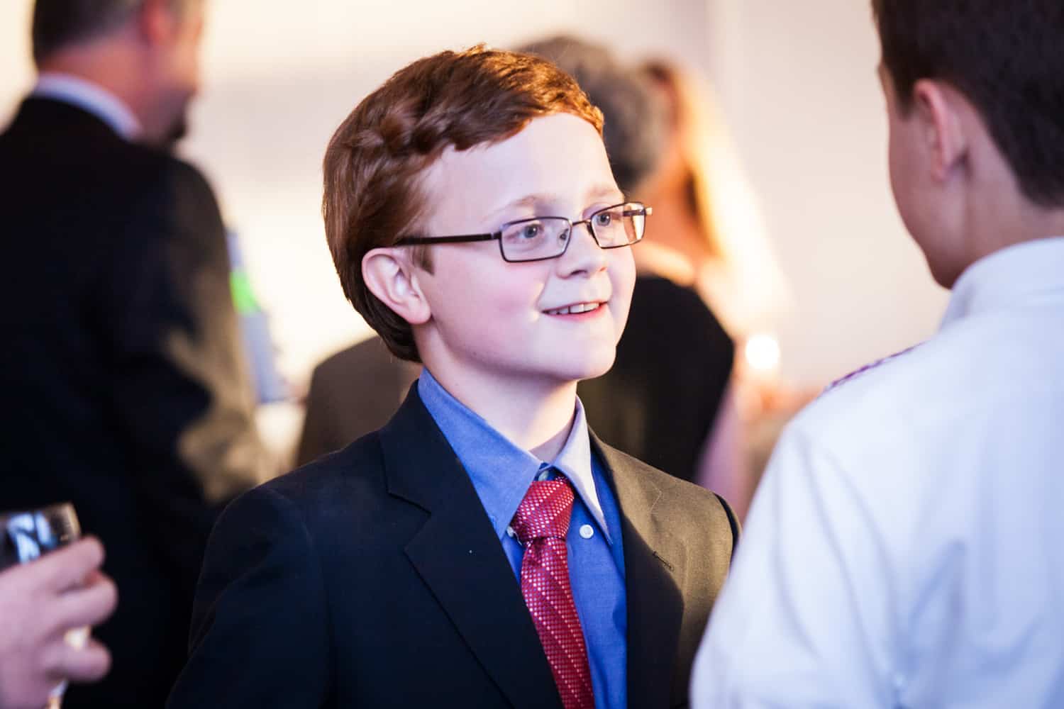 Birthday boy at a bar mitzvah for an article on how to plan the perfect bar mitzvah