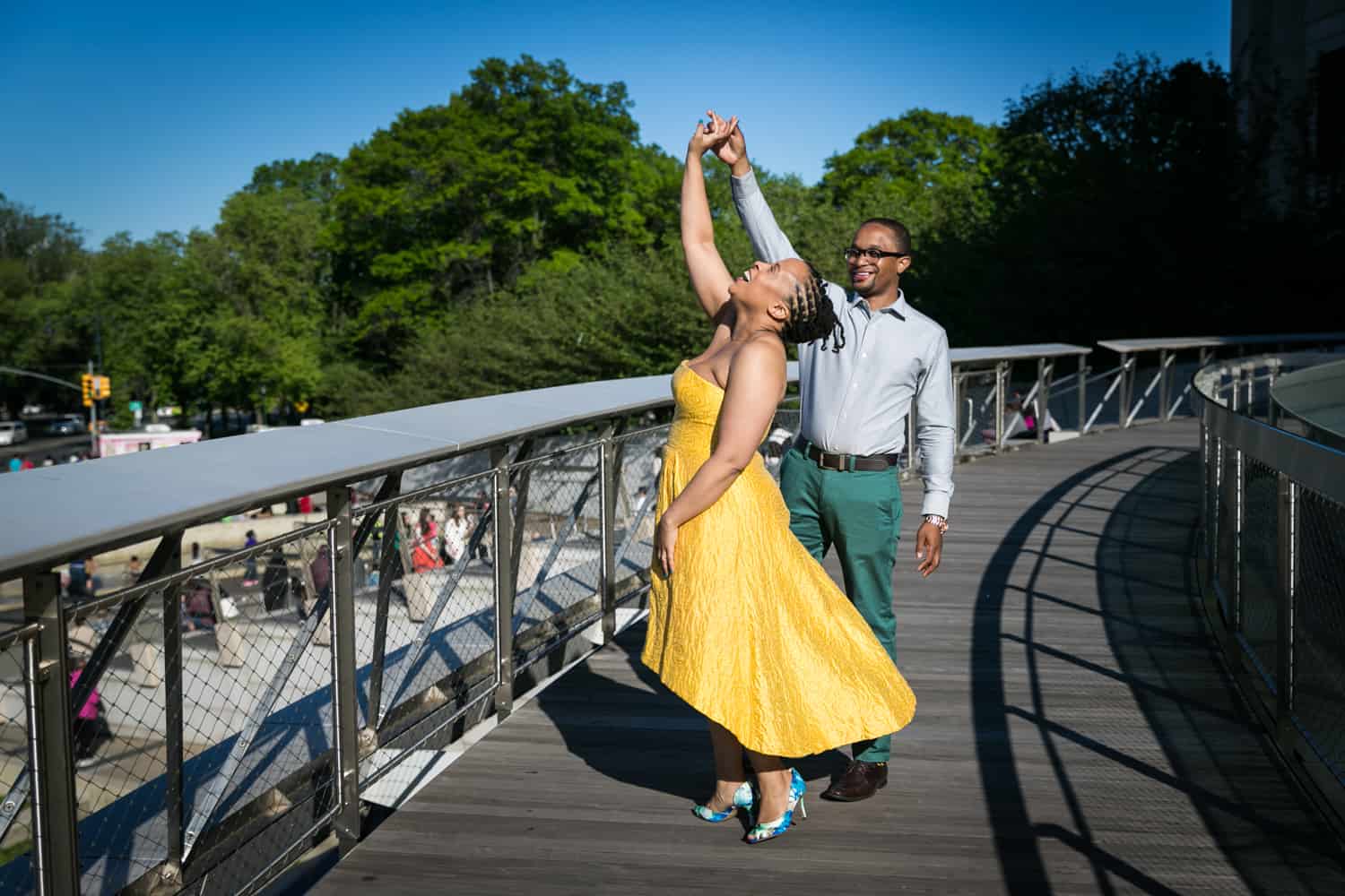 Couple dancing on roof of Brooklyn Musuem at a Brooklyn Museum engagement shoot