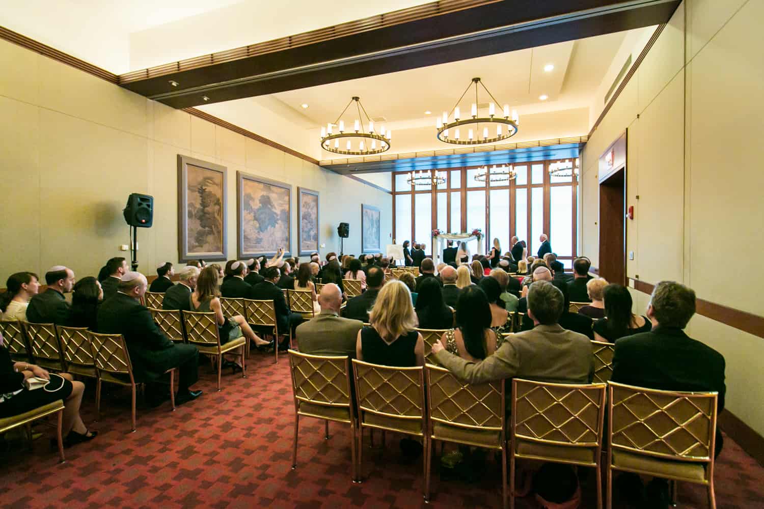 Wide shot of room during Harvard Club wedding ceremony