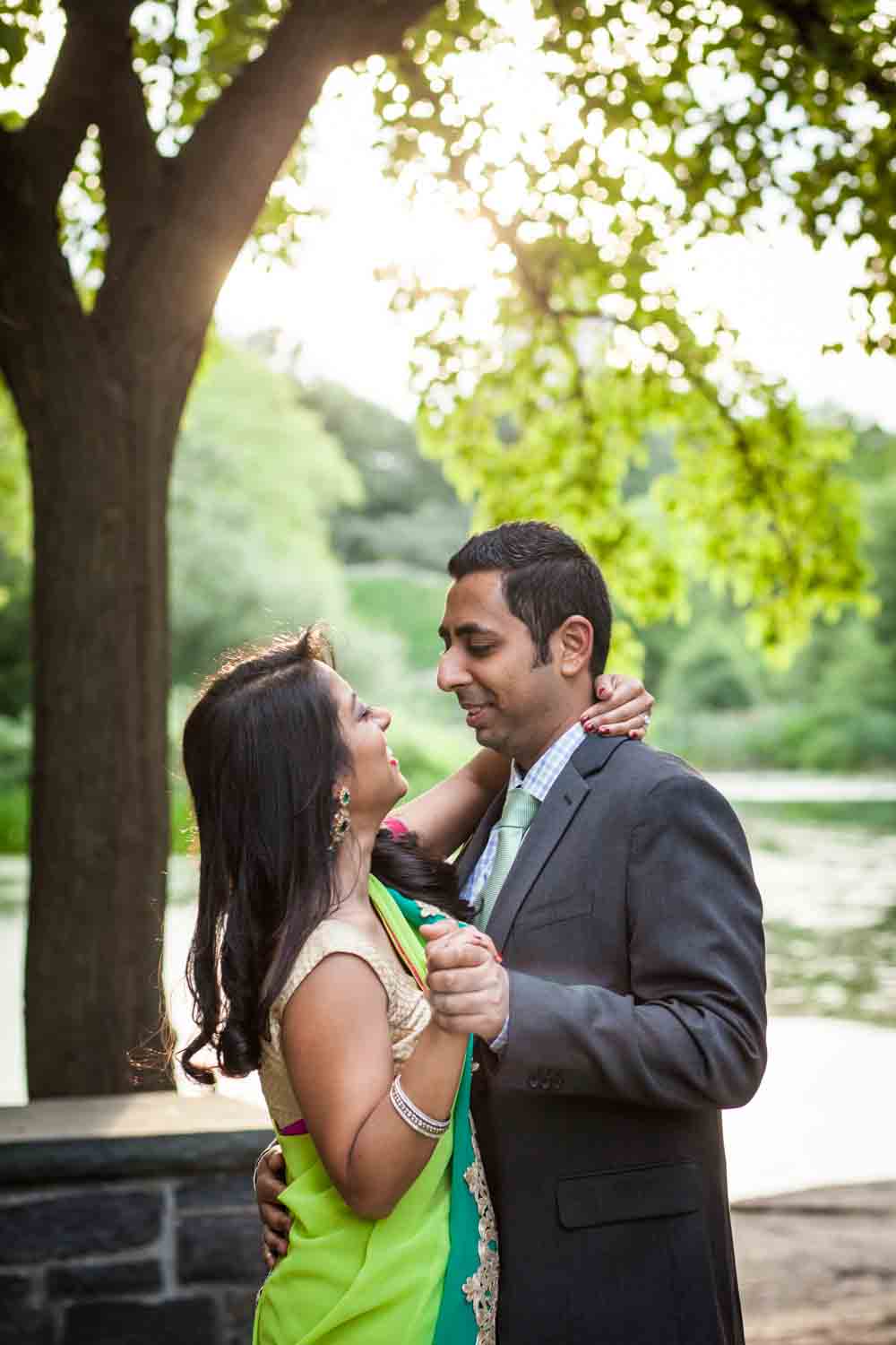 Indian couple dancing at a Central Park engagement shoot for an article on NYC engagement shoot ideas