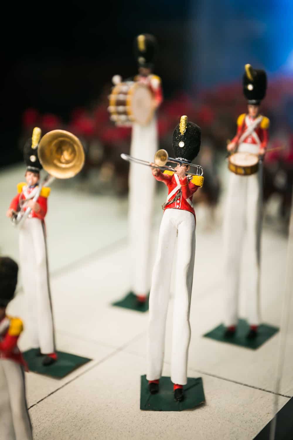Miniature band performers with extra long legs