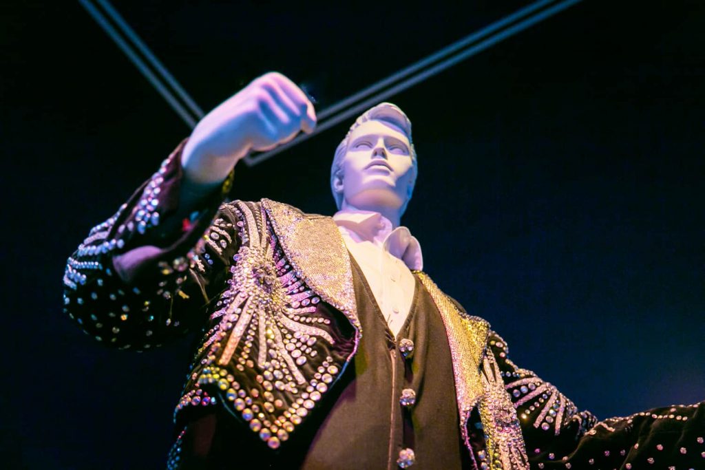 Mannequin wearing elaborate, sequined jacket