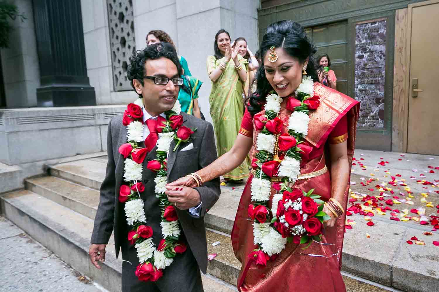 Indian bride and groom leaving City Clerk's office at a NYC City Hall Indian wedding