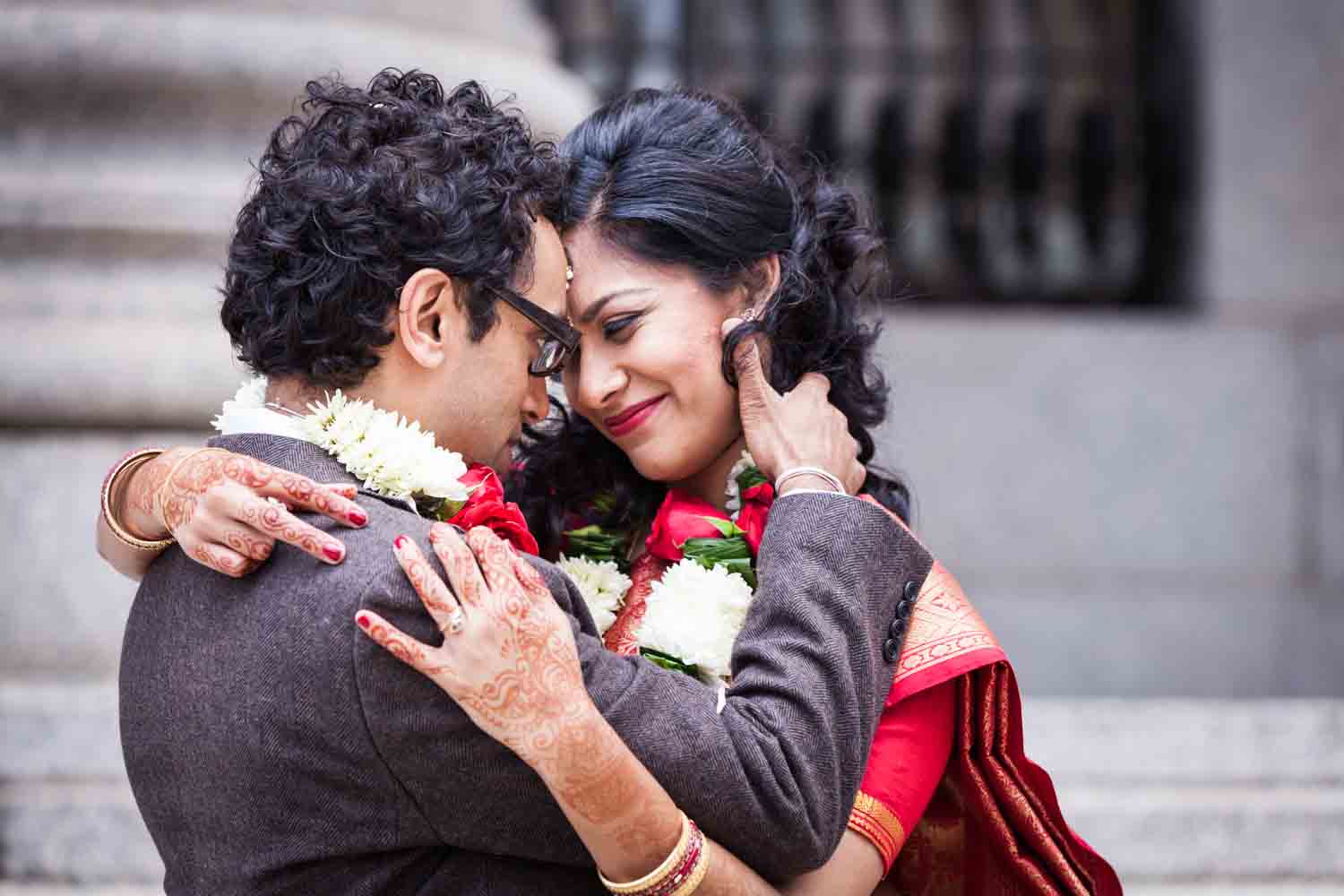 Indian couple hugging after a NYC City Hall Indian wedding