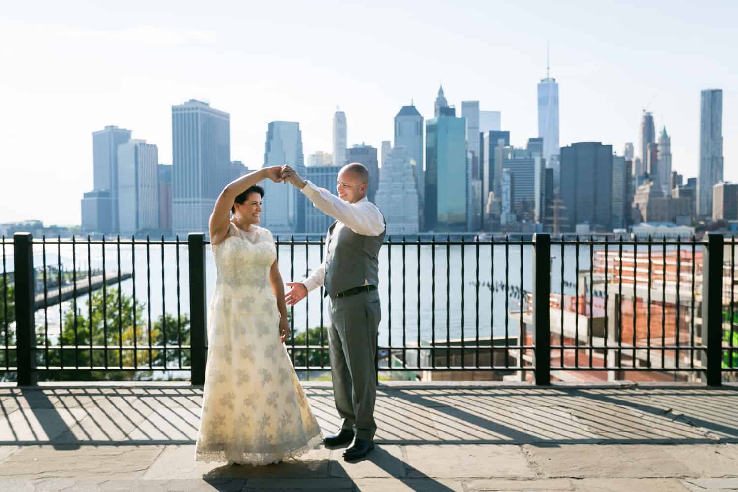 Bride and groom dancing on Brooklyn Promenade