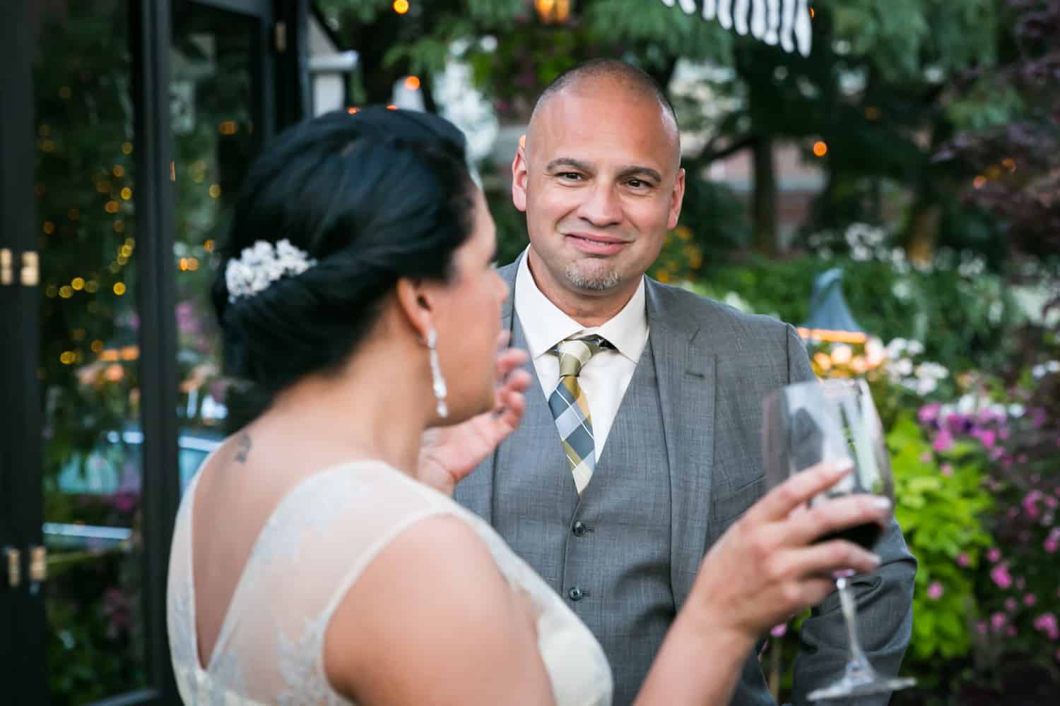 Bride and groom chatting at a River Café wedding in Brooklyn
