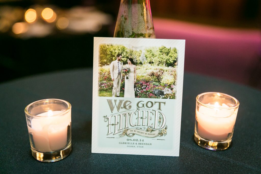 Wedding announcement postcard with sign 'We Got Hitched'
