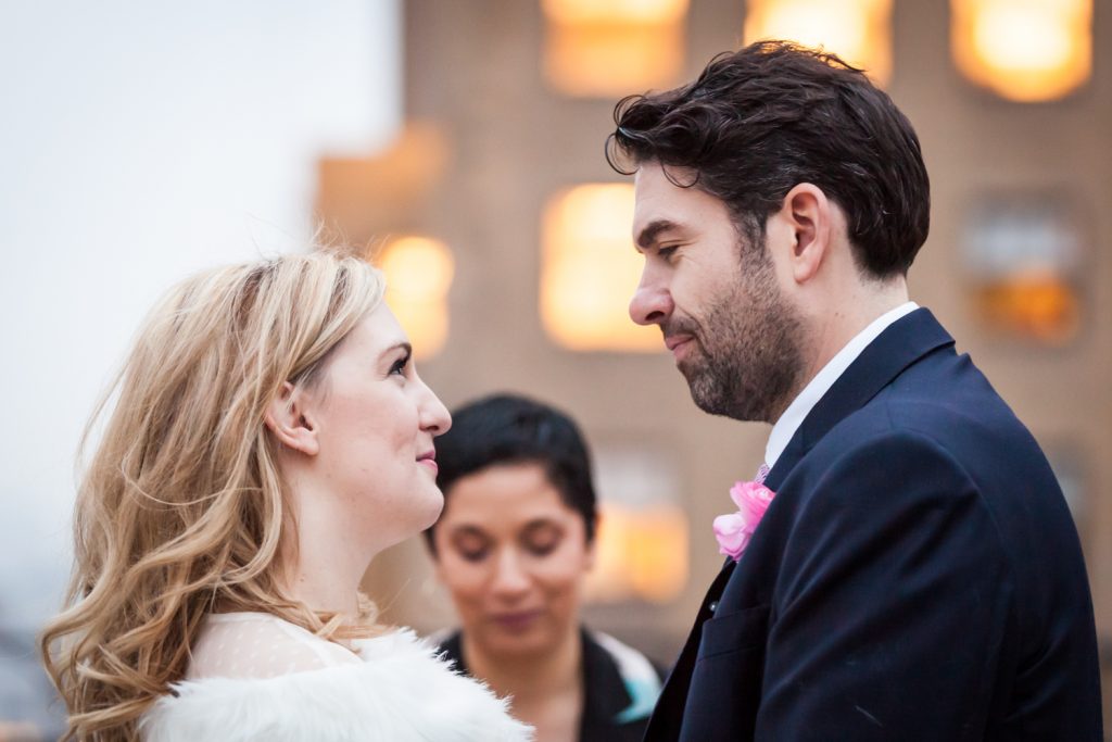 Close up of bride and groom looking at each other at a Grand Hyatt Hotel rooftop wedding