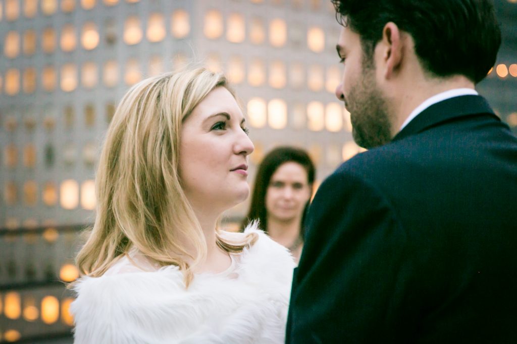 Bride and groom looking at each other at a Grand Hyatt Hotel rooftop wedding