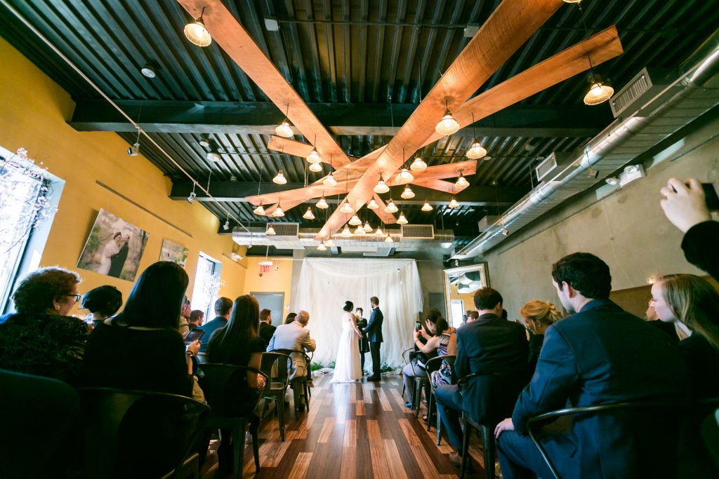 Wide shot of ceremony at an Astoria restaurant wedding