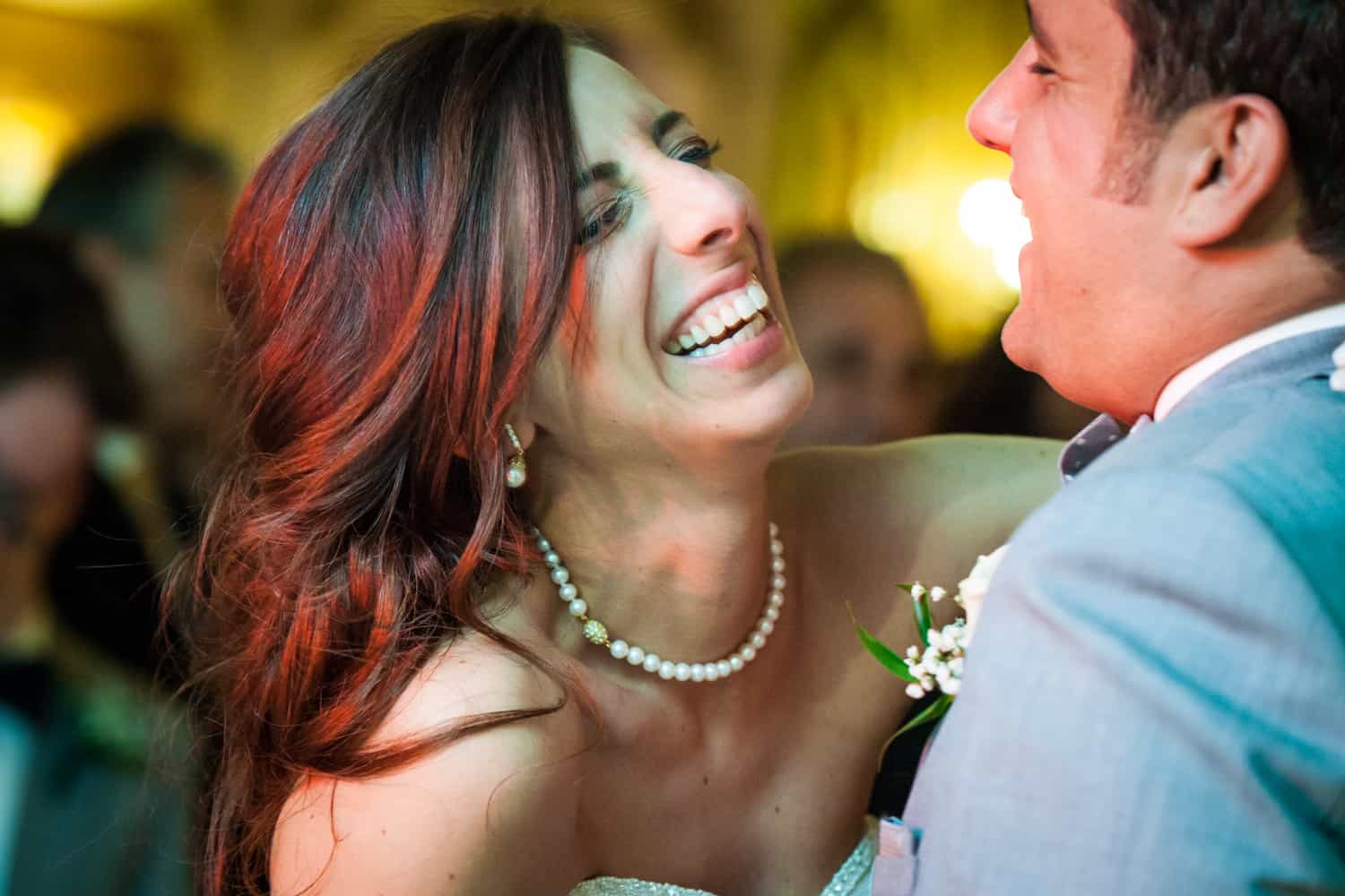 Bride laughing during first dance at a Manor wedding reception