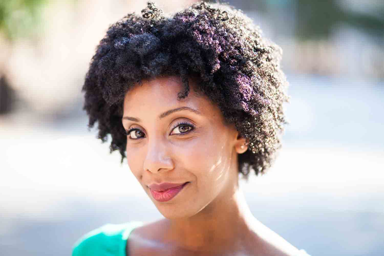 Headshot retouching images before and after of an African American woman