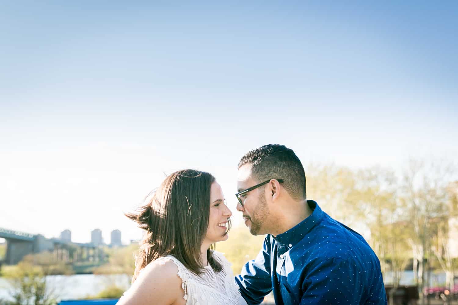 Couple looking at each other during an Astoria Park engagement shoot