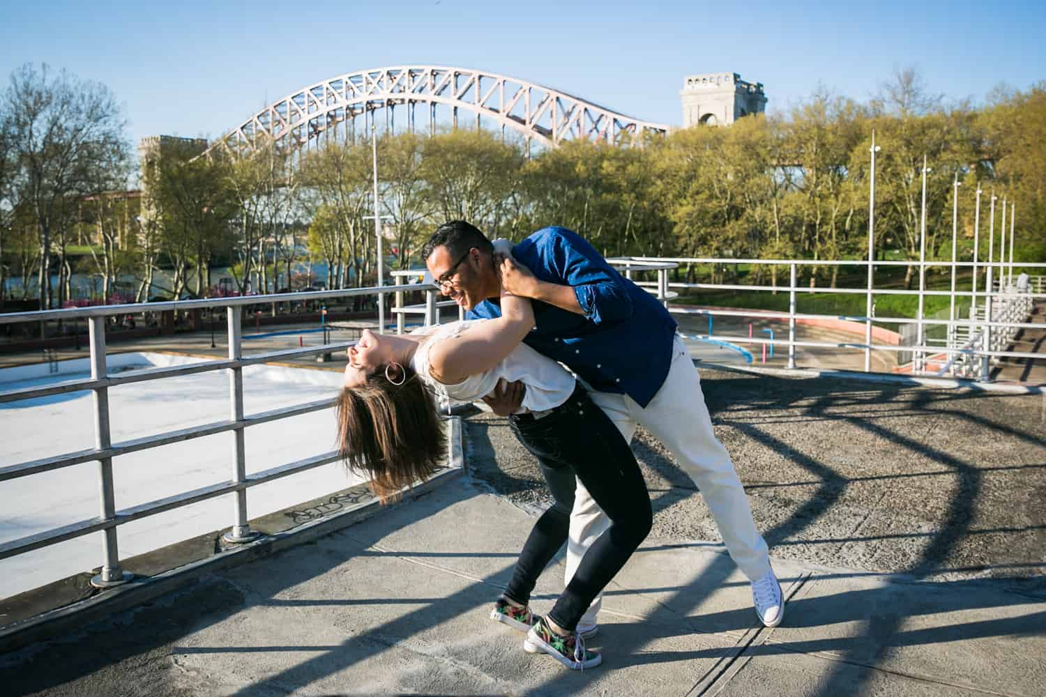 Couple dancing on Astoria Pool platform 