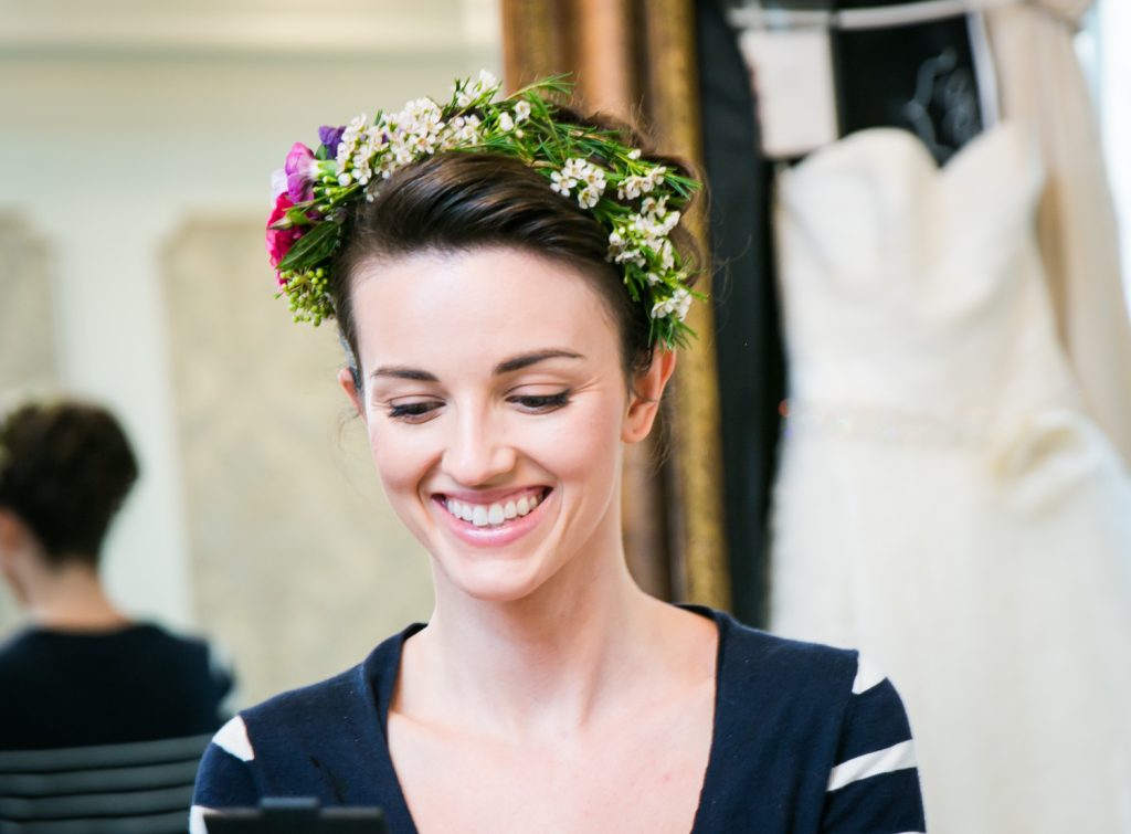 Bride with flower crown getting ready at a Snug Harbor wedding
