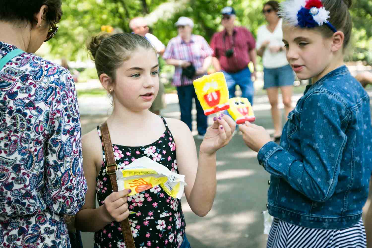 Two little girls in Central Park holding Spongebob ice creams