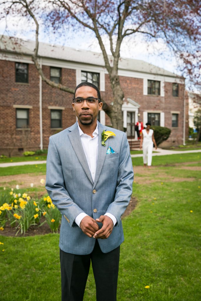 Groom waiting for bride for an article on how to get the perfect first look