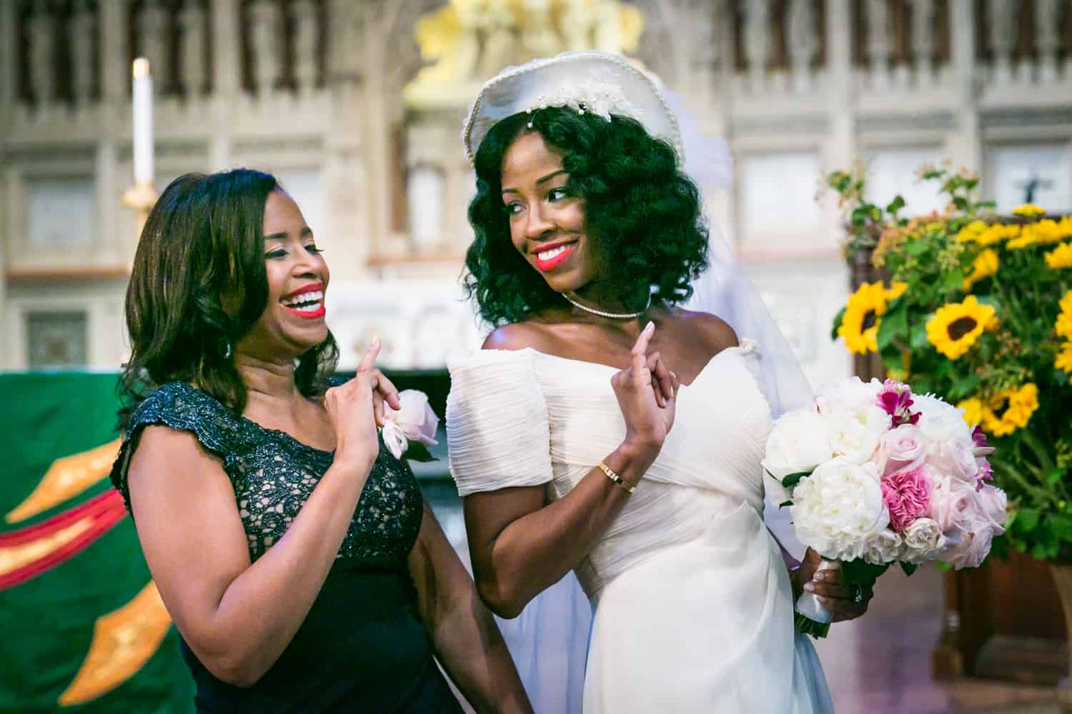 Bride dancing with mother in Trinity Church
