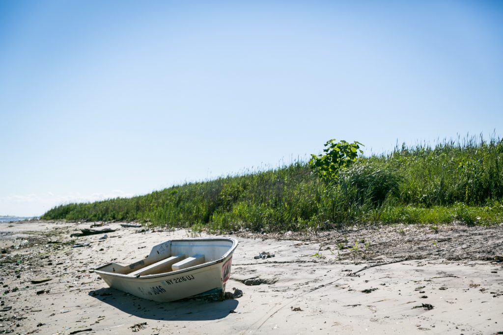 Dead Horse Bay photos of rowboat on beach