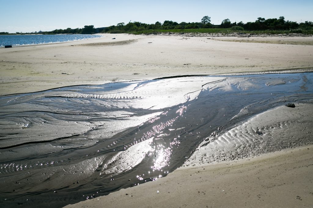 Dead Horse Bay photos of water flowing along beach