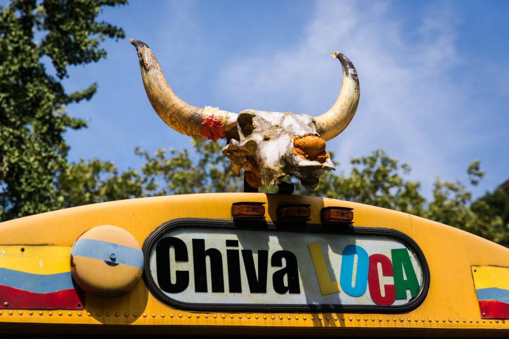 Chiva Loca bus with bull skull and horns at a DUMBO Loft wedding