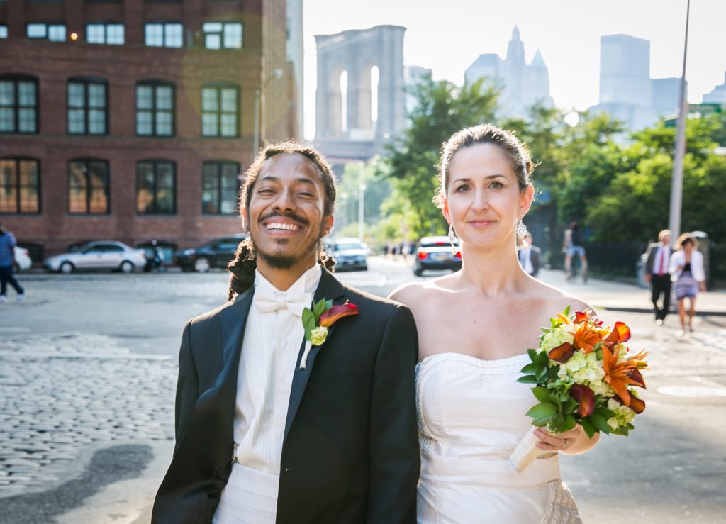 Bride and groom walking from Brooklyn Bridge Park