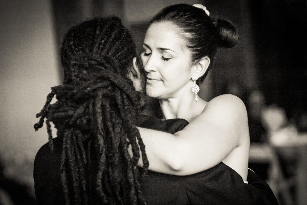 Black and white first dance photos of bride and groom at a DUMBO Loft wedding in Brooklyn