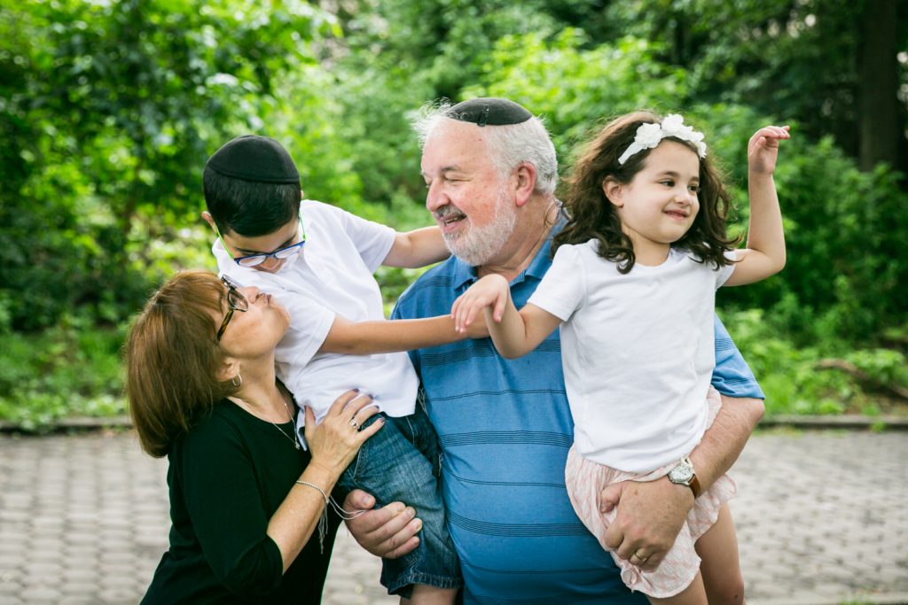 Prospect Park family photos of grandparents holding two grandkids