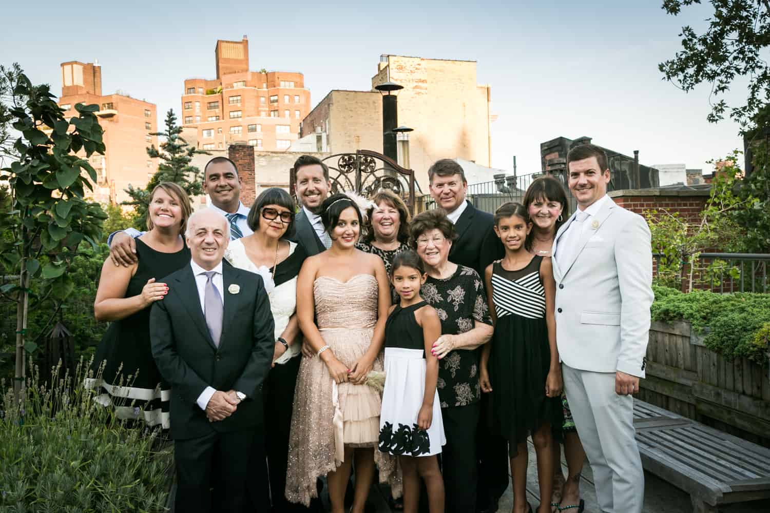 Family portrait on roof at a 632 on Hudson wedding