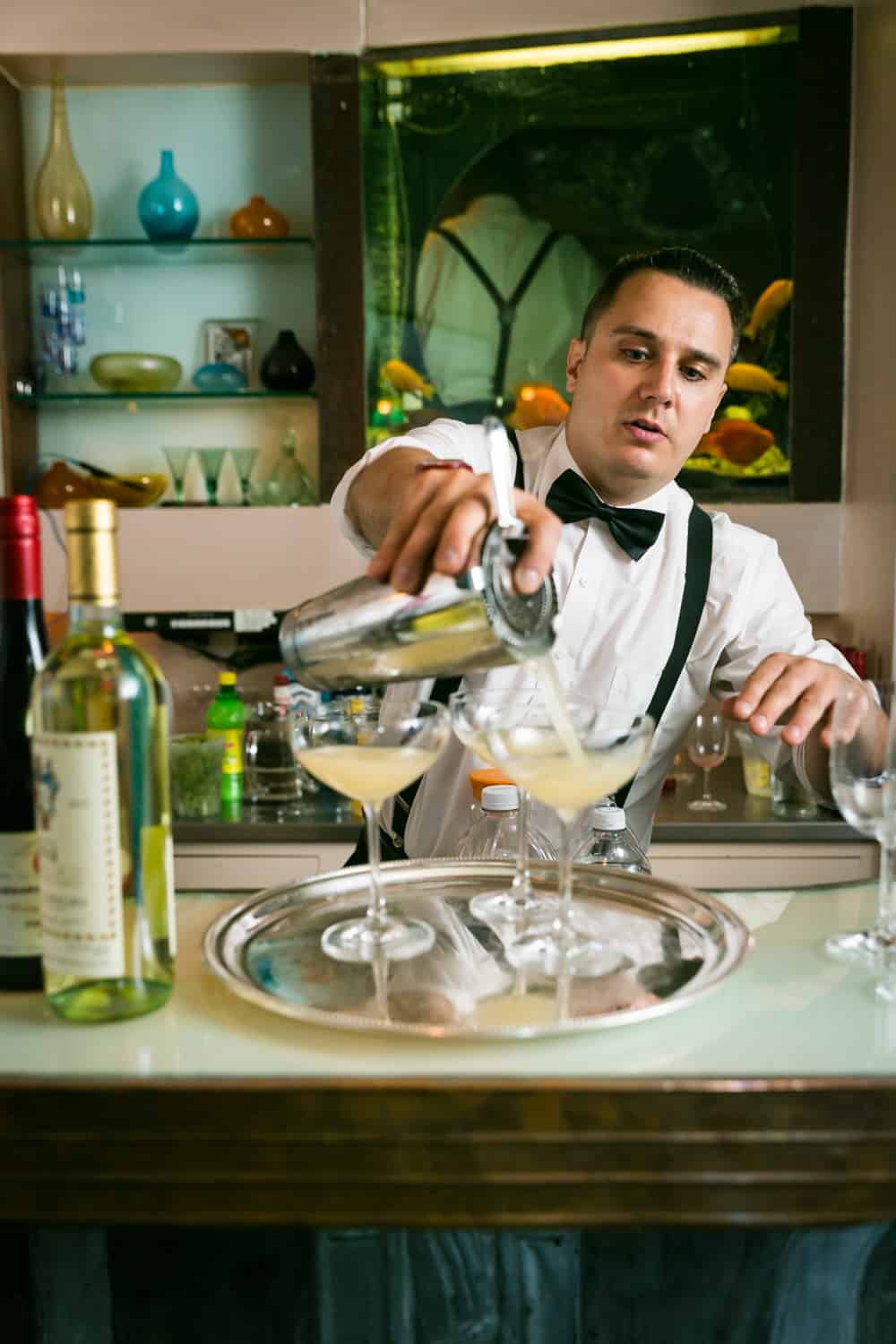 Bartender pouring cocktail at a 632 on Hudson wedding