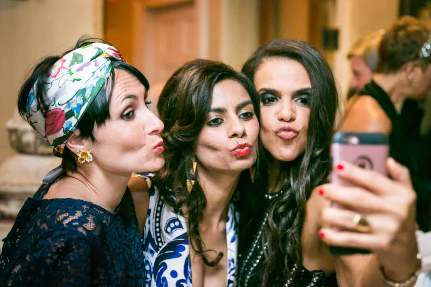 Three women taking a selfie at a 632 on Hudson wedding