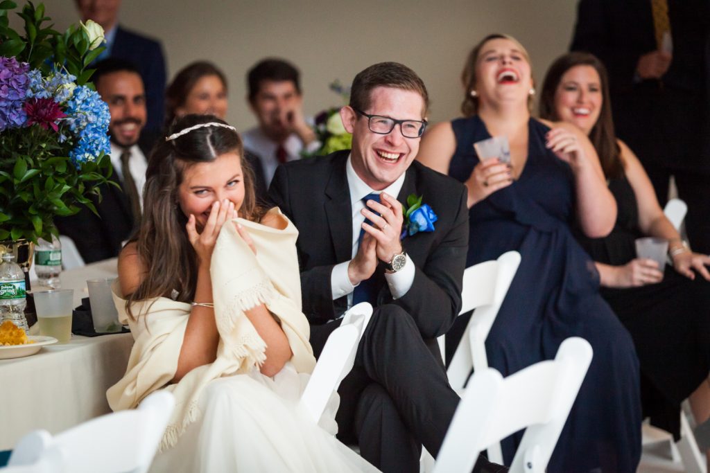 Bride and groom laughing during Bathhouse Studios wedding reception