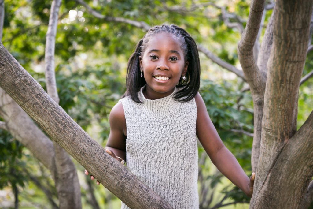 Young girl in tree