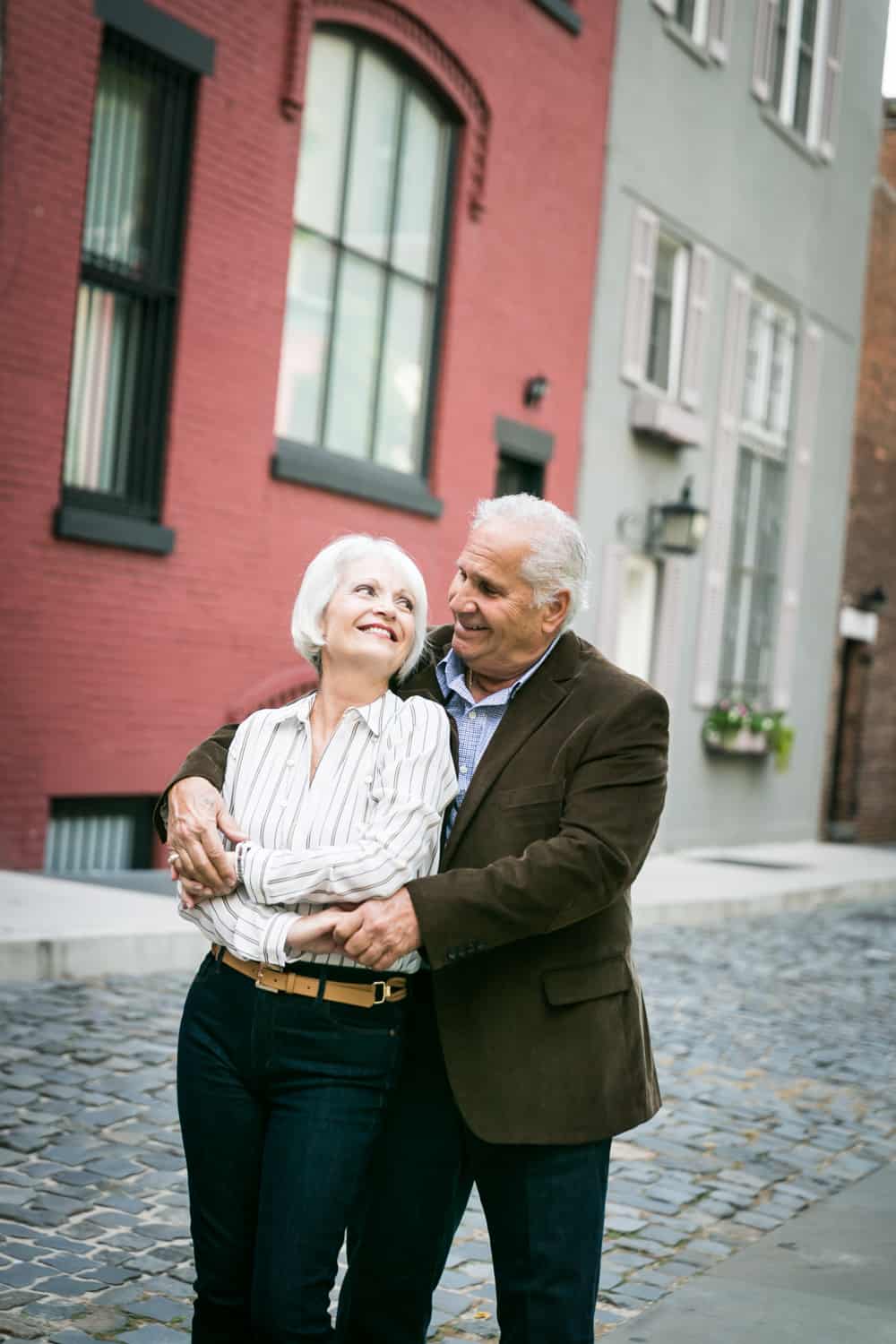Photojournalistic portraits of older couple dancing in Washington Mews