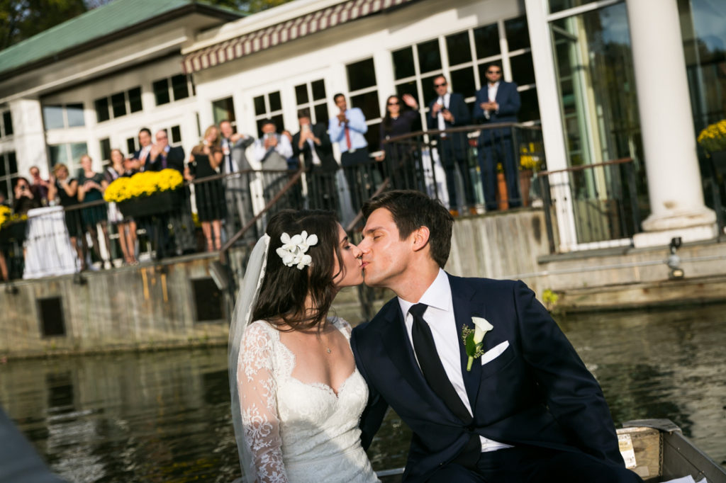 Bride and groom in a Central Park rowboat
