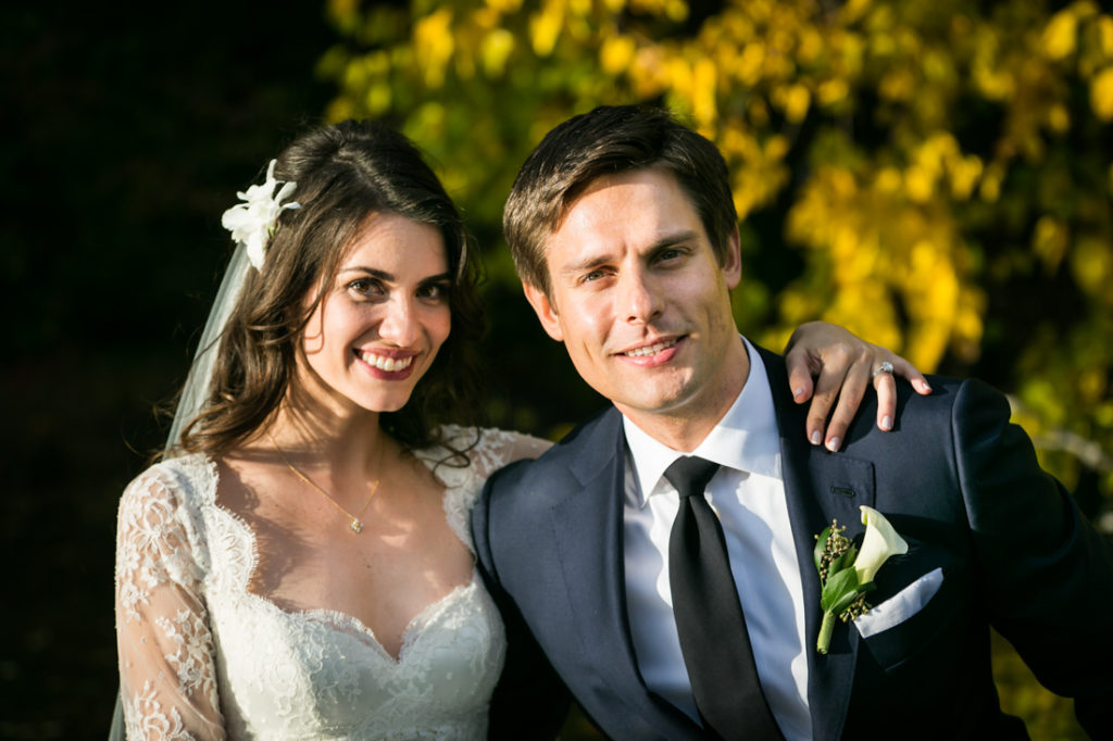 Bride and groom in a Central Park rowboat