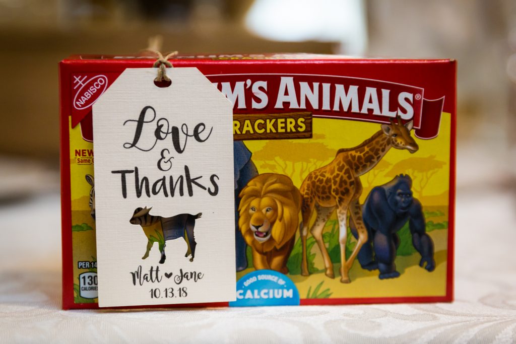 Box of animal crackers with note for article on creative guest favors