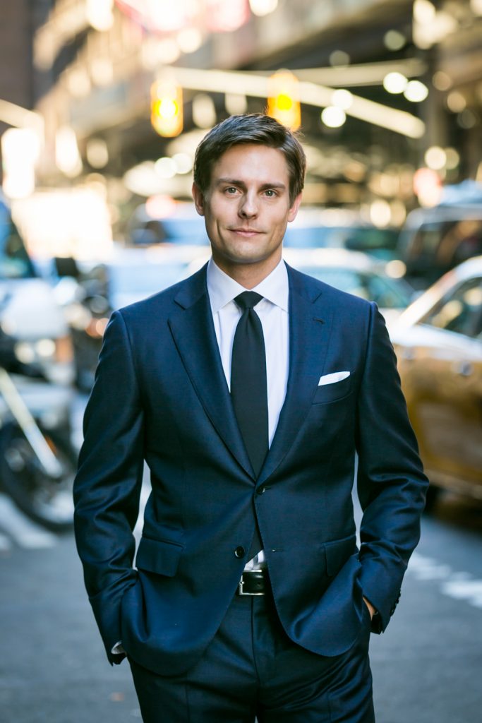 Portrait of groom standing on NYC street