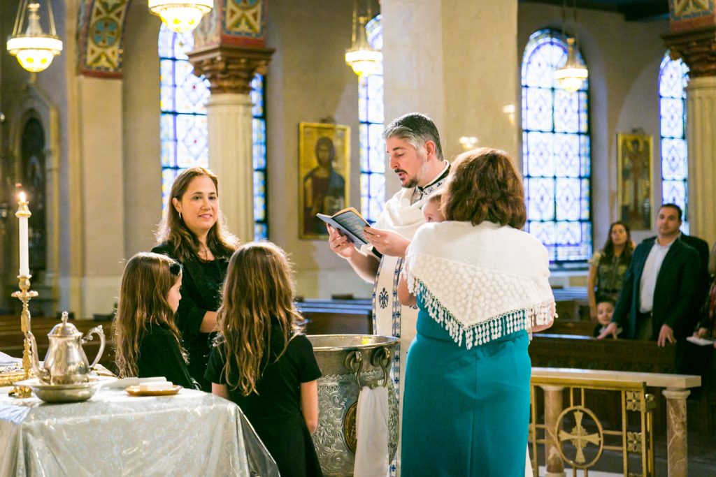 Priest and godparents during ceremony by NYC Greek orthodox baptism photographer, Kelly Williams