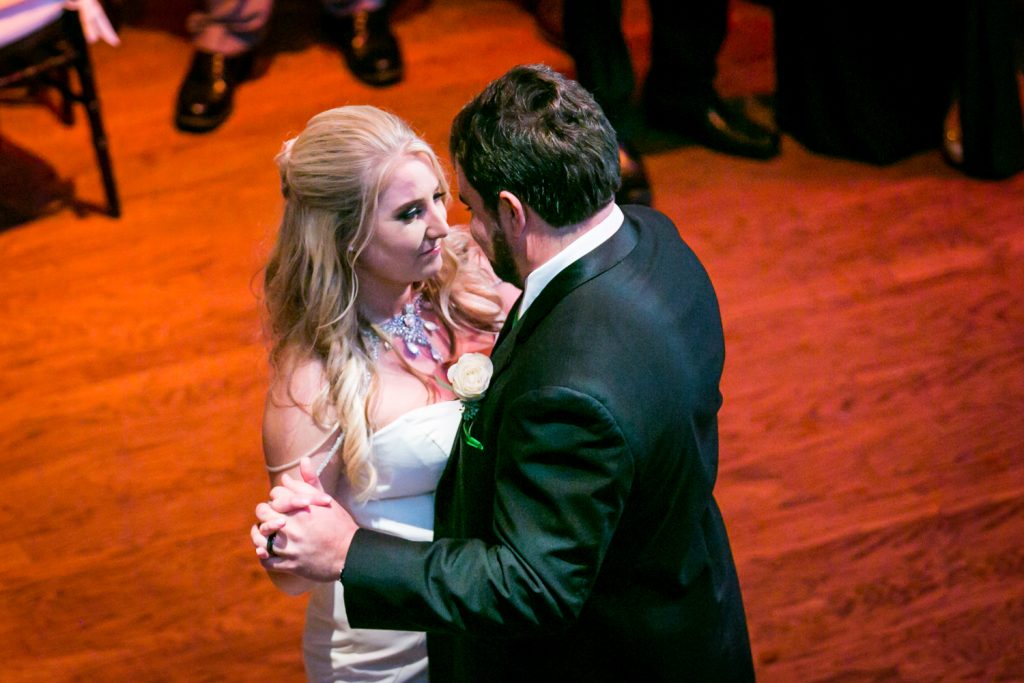 Close up on bride and groom's first dance for an article on how DJ lighting affects your wedding photos