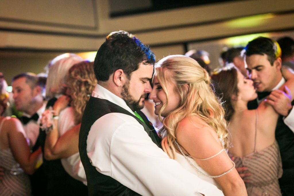 Bride and groom dancing close at a West Palm Beach wedding