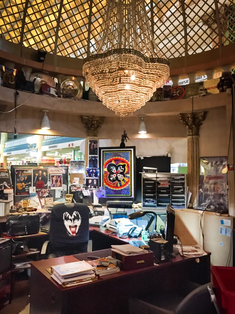 Chandelier and music equipment in the former Kapok Tree Restaurant, now a Sam Ash music store