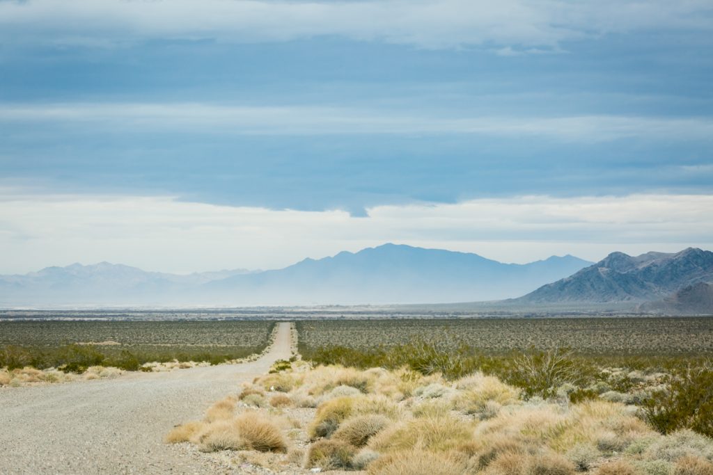 Road leading to mountains in Death Valley National Park