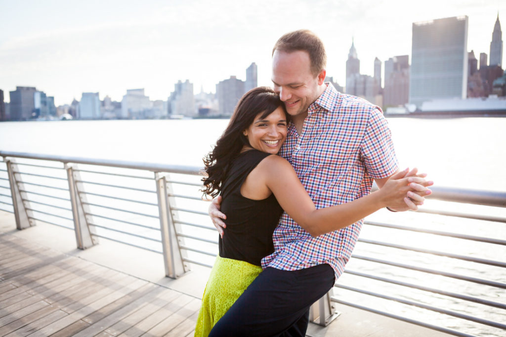 Couple dancing at Gantry Plaza State Park for an article on best engagement photos