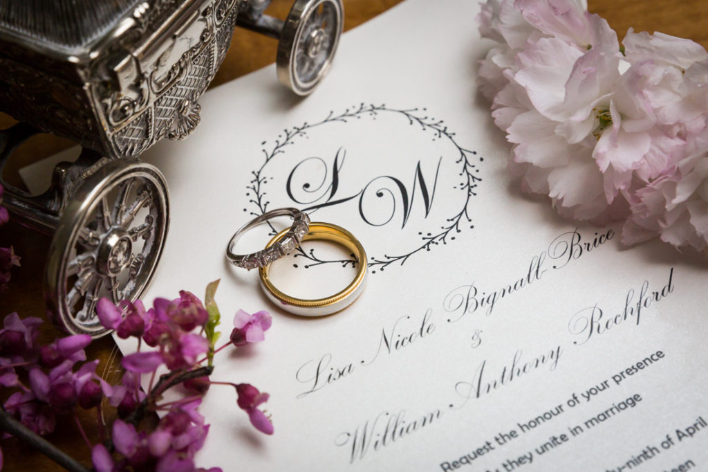 Wedding rings and invitations at a Glen Terrace wedding